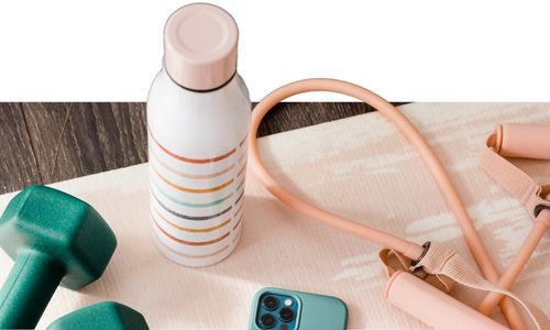 weight loss plan option - a water bottle alongside a set of hand weights and a jump rope